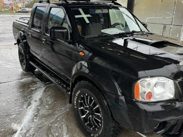 Чорний Ніссан Навара, об'ємом двигуна 2.5 л та пробігом 330 тис. км за 4500 $, фото 12 на Automoto.ua