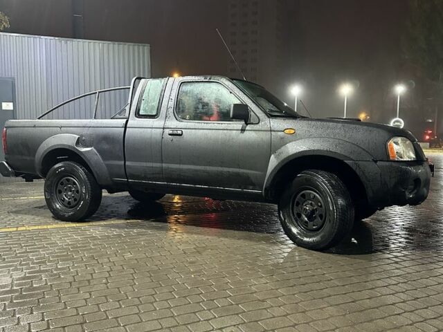 Черный Ниссан Навара, объемом двигателя 2.5 л и пробегом 180 тыс. км за 4500 $, фото 6 на Automoto.ua