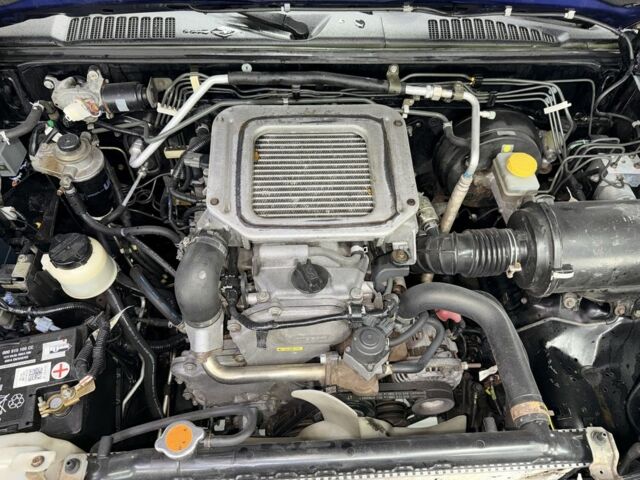 Черный Ниссан Навара, объемом двигателя 2.5 л и пробегом 200 тыс. км за 4750 $, фото 16 на Automoto.ua