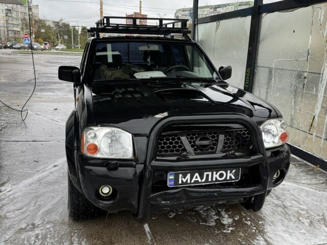 Чорний Ніссан Навара, об'ємом двигуна 2.5 л та пробігом 330 тис. км за 4500 $, фото 11 на Automoto.ua