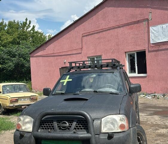 Чорний Ніссан Навара, об'ємом двигуна 2.5 л та пробігом 330 тис. км за 4500 $, фото 3 на Automoto.ua
