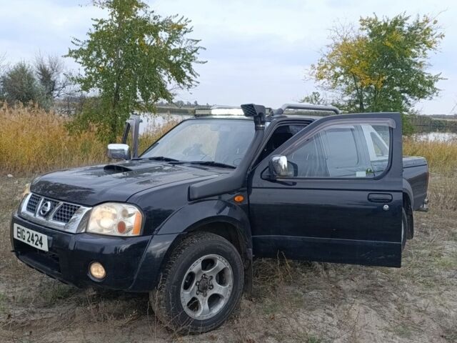 Черный Ниссан Навара, объемом двигателя 2.5 л и пробегом 100 тыс. км за 5300 $, фото 2 на Automoto.ua