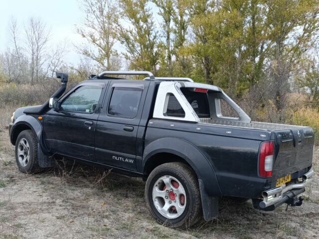 Черный Ниссан Навара, объемом двигателя 2.5 л и пробегом 100 тыс. км за 5300 $, фото 11 на Automoto.ua