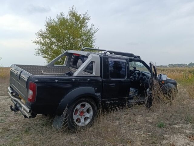 Черный Ниссан Навара, объемом двигателя 2.5 л и пробегом 100 тыс. км за 5300 $, фото 8 на Automoto.ua