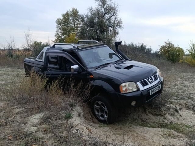 Черный Ниссан Навара, объемом двигателя 2.5 л и пробегом 100 тыс. км за 5300 $, фото 9 на Automoto.ua