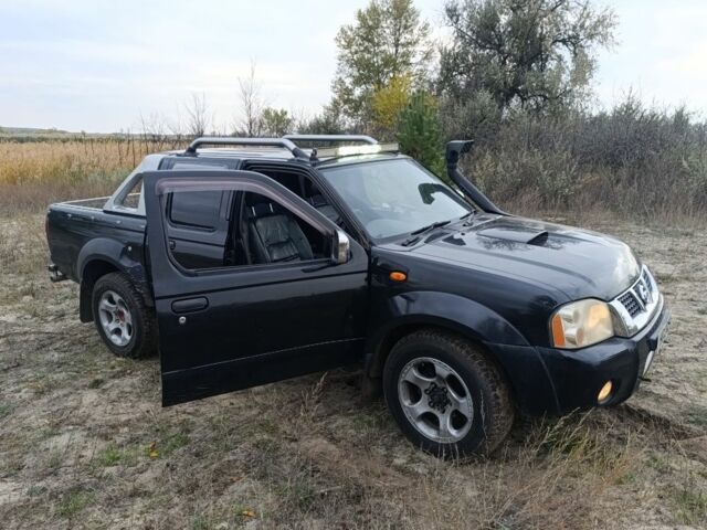 Черный Ниссан Навара, объемом двигателя 2.5 л и пробегом 100 тыс. км за 5300 $, фото 3 на Automoto.ua