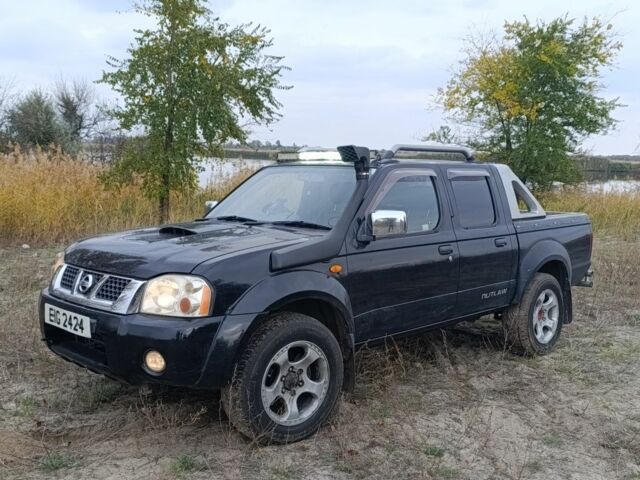 Черный Ниссан Навара, объемом двигателя 2.5 л и пробегом 100 тыс. км за 5300 $, фото 1 на Automoto.ua