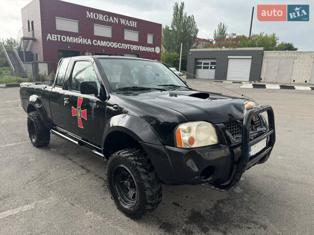 Черный Ниссан Навара, объемом двигателя 2.5 л и пробегом 230 тыс. км за 5000 $, фото 3 на Automoto.ua