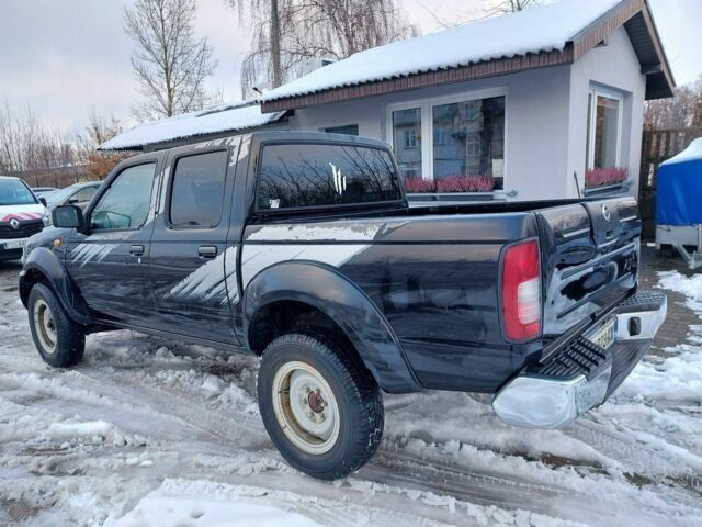 Чорний Ніссан Навара, об'ємом двигуна 2.5 л та пробігом 168 тис. км за 2649 $, фото 2 на Automoto.ua
