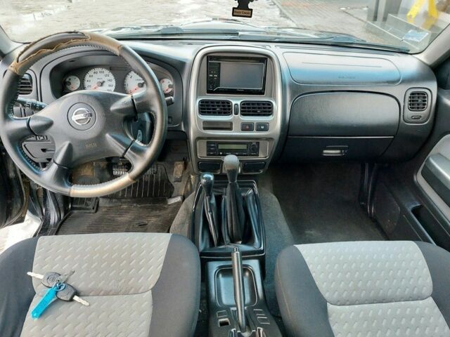 Чорний Ніссан Навара, об'ємом двигуна 2.5 л та пробігом 168 тис. км за 2649 $, фото 6 на Automoto.ua