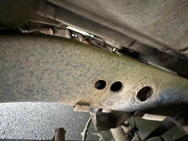 Черный Ниссан Навара, объемом двигателя 2.5 л и пробегом 170 тыс. км за 4900 $, фото 12 на Automoto.ua