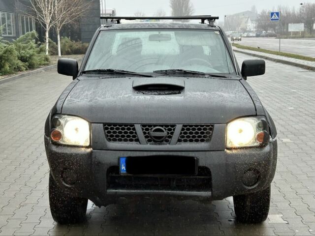 Черный Ниссан Навара, объемом двигателя 2.5 л и пробегом 200 тыс. км за 3450 $, фото 7 на Automoto.ua