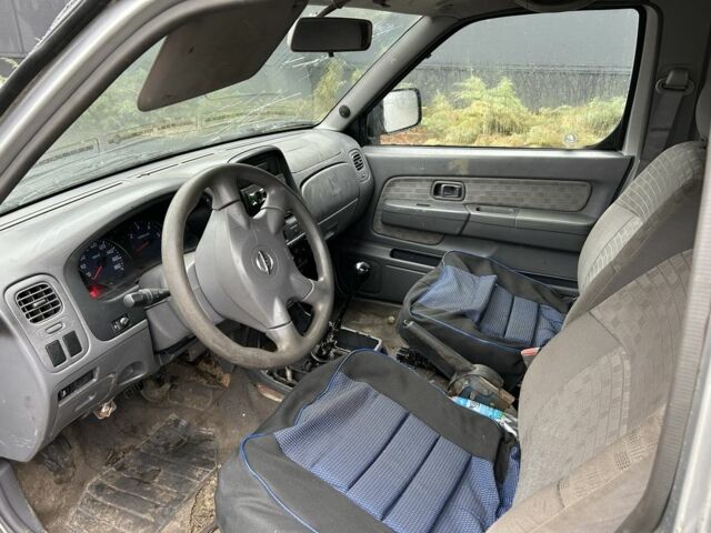 Черный Ниссан Навара, объемом двигателя 2.5 л и пробегом 200 тыс. км за 3450 $, фото 8 на Automoto.ua