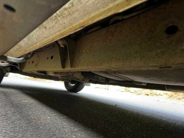 Черный Ниссан Навара, объемом двигателя 2.5 л и пробегом 170 тыс. км за 4900 $, фото 13 на Automoto.ua