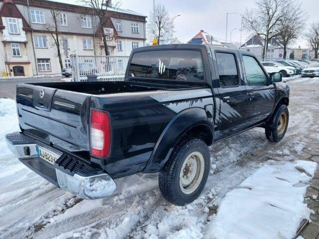 Чорний Ніссан Навара, об'ємом двигуна 2.5 л та пробігом 168 тис. км за 2649 $, фото 4 на Automoto.ua