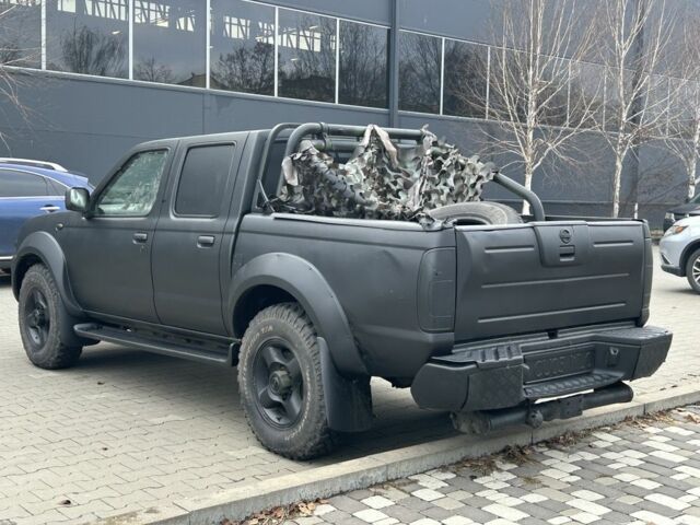 Черный Ниссан Навара, объемом двигателя 2.5 л и пробегом 220 тыс. км за 4250 $, фото 4 на Automoto.ua