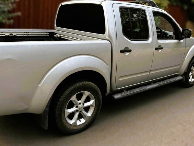 Черный Ниссан Навара, объемом двигателя 2.5 л и пробегом 170 тыс. км за 4900 $, фото 1 на Automoto.ua