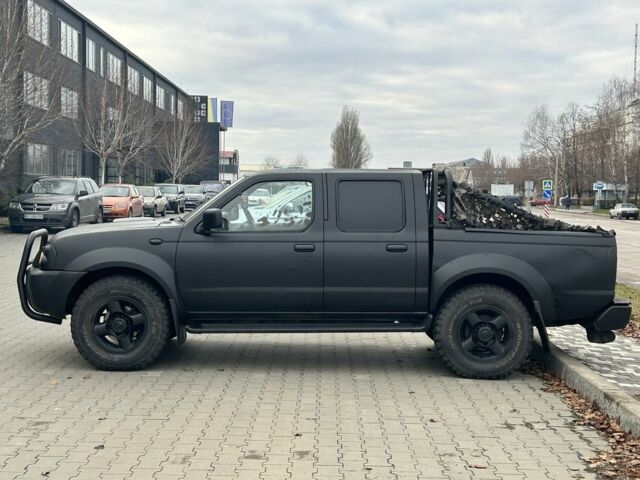 Черный Ниссан Навара, объемом двигателя 2.5 л и пробегом 220 тыс. км за 4250 $, фото 5 на Automoto.ua