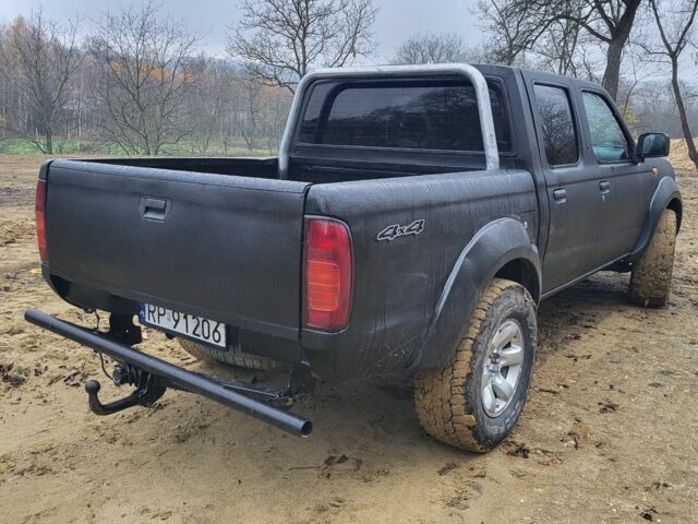 Чорний Ніссан Навара, об'ємом двигуна 2.5 л та пробігом 248 тис. км за 2500 $, фото 3 на Automoto.ua