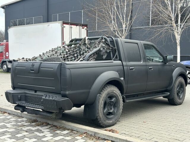 Черный Ниссан Навара, объемом двигателя 2.5 л и пробегом 220 тыс. км за 4250 $, фото 2 на Automoto.ua