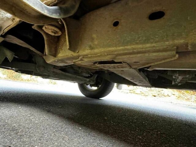 Черный Ниссан Навара, объемом двигателя 2.5 л и пробегом 170 тыс. км за 4900 $, фото 9 на Automoto.ua