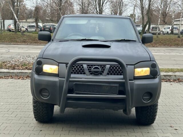 Черный Ниссан Навара, объемом двигателя 2.5 л и пробегом 220 тыс. км за 4250 $, фото 7 на Automoto.ua