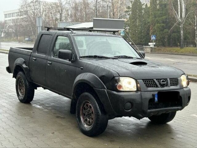 Черный Ниссан Навара, объемом двигателя 2.5 л и пробегом 200 тыс. км за 3450 $, фото 6 на Automoto.ua