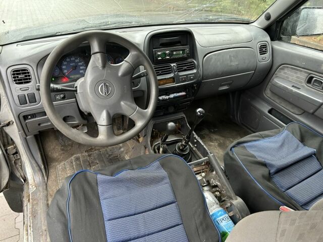 Черный Ниссан Навара, объемом двигателя 2.5 л и пробегом 200 тыс. км за 3450 $, фото 9 на Automoto.ua