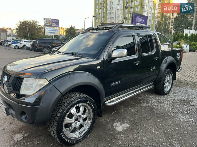 Чорний Ніссан Навара, об'ємом двигуна 2.49 л та пробігом 275 тис. км за 12500 $, фото 1 на Automoto.ua