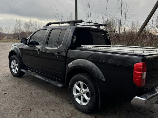 Черный Ниссан Навара, объемом двигателя 2.5 л и пробегом 330 тыс. км за 11999 $, фото 2 на Automoto.ua