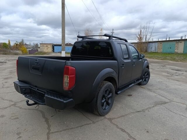 Черный Ниссан Навара, объемом двигателя 2.5 л и пробегом 333 тыс. км за 4700 $, фото 2 на Automoto.ua