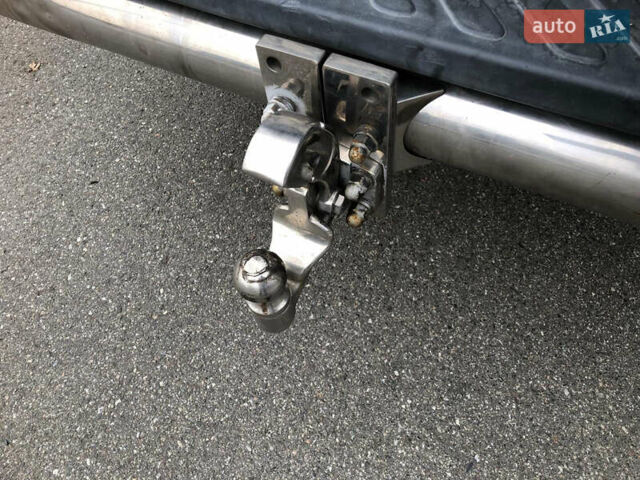 Черный Ниссан Навара, объемом двигателя 2.49 л и пробегом 200 тыс. км за 10000 $, фото 32 на Automoto.ua