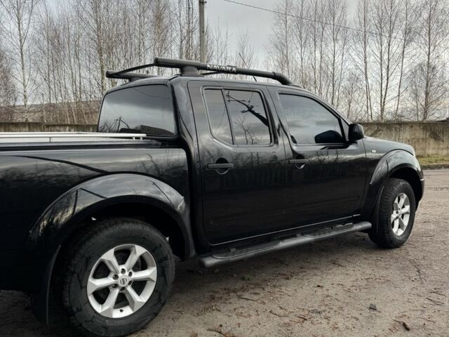 Черный Ниссан Навара, объемом двигателя 2.5 л и пробегом 330 тыс. км за 11999 $, фото 1 на Automoto.ua