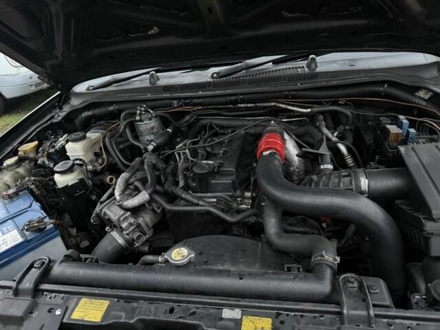 Черный Ниссан Навара, объемом двигателя 2.5 л и пробегом 210 тыс. км за 4000 $, фото 9 на Automoto.ua