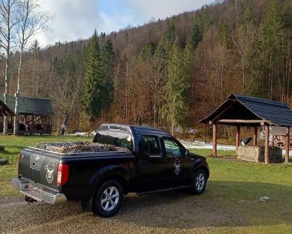 Черный Ниссан Навара, объемом двигателя 2.49 л и пробегом 279 тыс. км за 5800 $, фото 2 на Automoto.ua