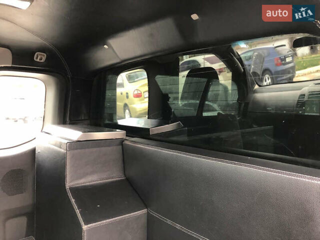 Черный Ниссан Навара, объемом двигателя 2.49 л и пробегом 200 тыс. км за 10000 $, фото 10 на Automoto.ua