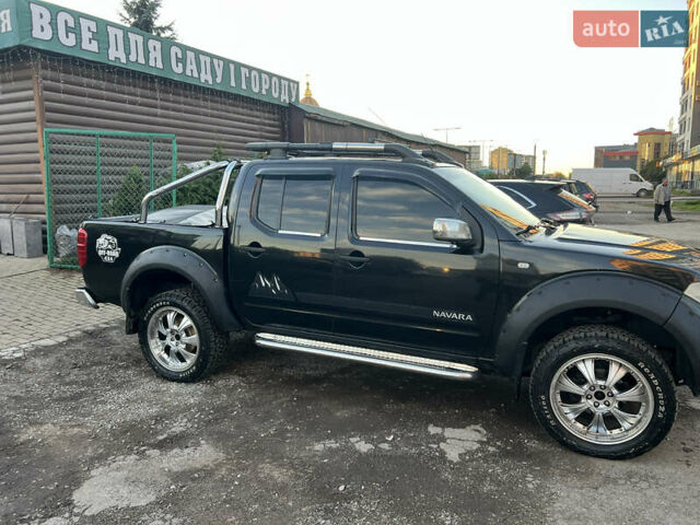 Чорний Ніссан Навара, об'ємом двигуна 2.49 л та пробігом 275 тис. км за 12500 $, фото 2 на Automoto.ua