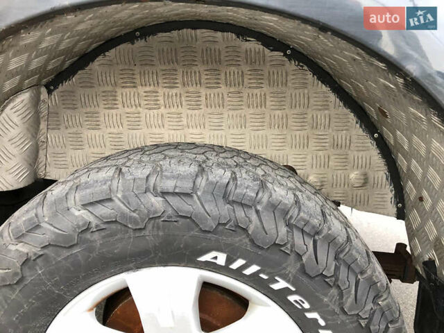 Черный Ниссан Навара, объемом двигателя 2.49 л и пробегом 200 тыс. км за 10000 $, фото 35 на Automoto.ua