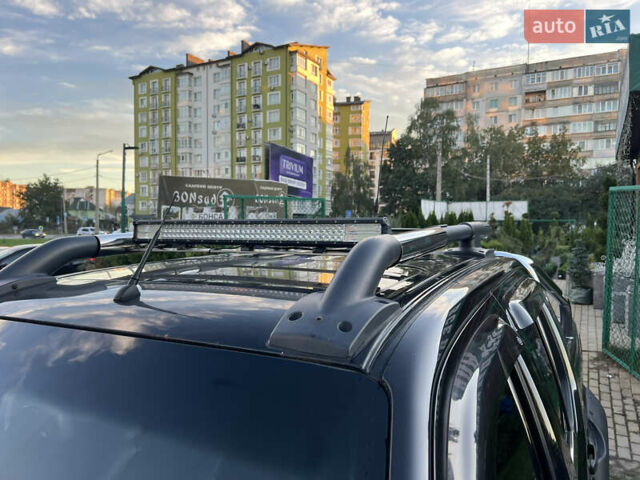 Чорний Ніссан Навара, об'ємом двигуна 2.49 л та пробігом 275 тис. км за 12500 $, фото 4 на Automoto.ua