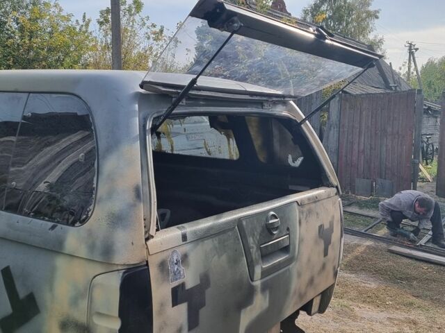 Черный Ниссан Навара, объемом двигателя 2.5 л и пробегом 200 тыс. км за 6500 $, фото 14 на Automoto.ua