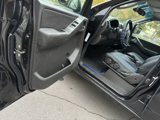 Ниссан Навара 2007 в Днепре (Днепропетровске) на Automoto.ua Черный Ниссан Навара, объемом двигателя 2.5 л и пробегом 200 тыс. км за 6700 $, фото 13 на Automoto.ua