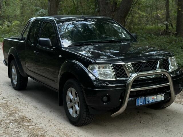 Черный Ниссан Навара, объемом двигателя 2.5 л и пробегом 267 тыс. км за 5750 $, фото 2 на Automoto.ua