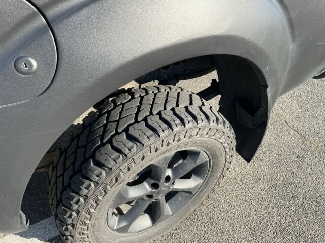 Черный Ниссан Навара, объемом двигателя 2.5 л и пробегом 270 тыс. км за 17200 $, фото 3 на Automoto.ua