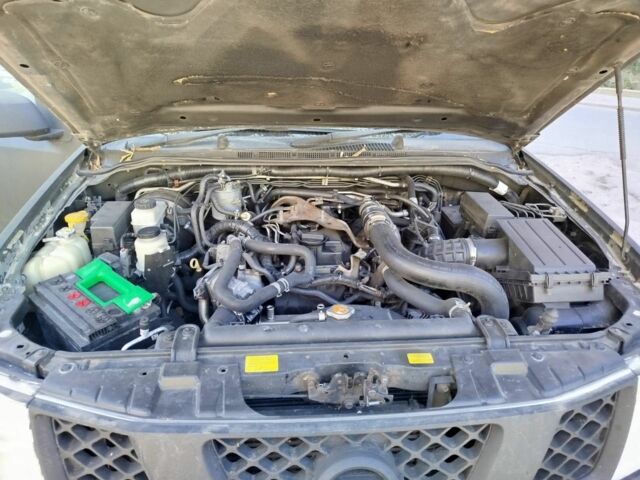 Черный Ниссан Навара, объемом двигателя 2.5 л и пробегом 125 тыс. км за 5100 $, фото 3 на Automoto.ua