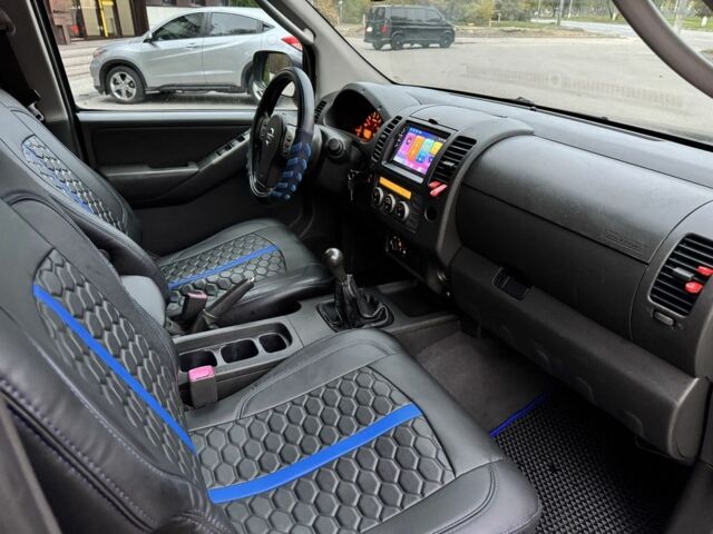 Ниссан Навара 2007 в Днепре (Днепропетровске) на Automoto.ua Черный Ниссан Навара, объемом двигателя 2.5 л и пробегом 200 тыс. км за 6700 $, фото 18 на Automoto.ua