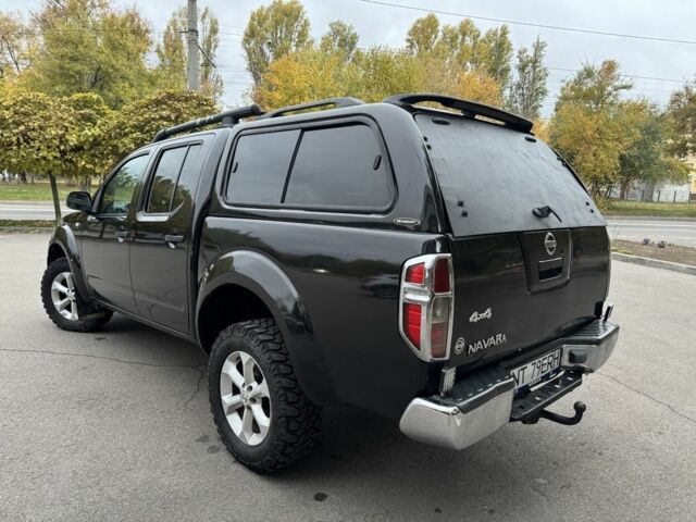 Ниссан Навара 2007 в Днепре (Днепропетровске) на Automoto.ua Черный Ниссан Навара, объемом двигателя 2.5 л и пробегом 200 тыс. км за 6700 $, фото 2 на Automoto.ua