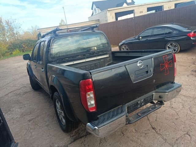 Черный Ниссан Навара, объемом двигателя 2.5 л и пробегом 300 тыс. км за 2800 $, фото 1 на Automoto.ua