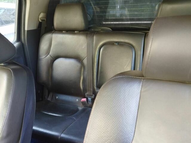 Черный Ниссан Навара, объемом двигателя 2.5 л и пробегом 125 тыс. км за 5100 $, фото 6 на Automoto.ua