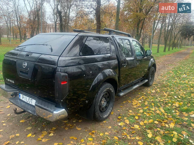 Черный Ниссан Навара, объемом двигателя 2.5 л и пробегом 260 тыс. км за 9500 $, фото 3 на Automoto.ua