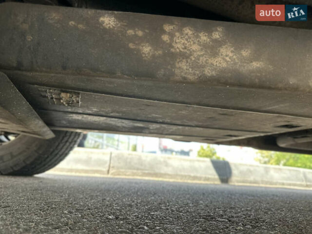 Черный Ниссан Навара, объемом двигателя 2.49 л и пробегом 300 тыс. км за 7237 $, фото 12 на Automoto.ua